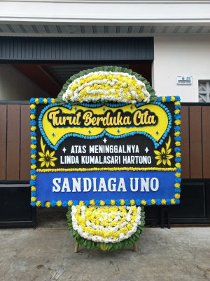 Papan Bunga Duka di Simpang Bingkuang